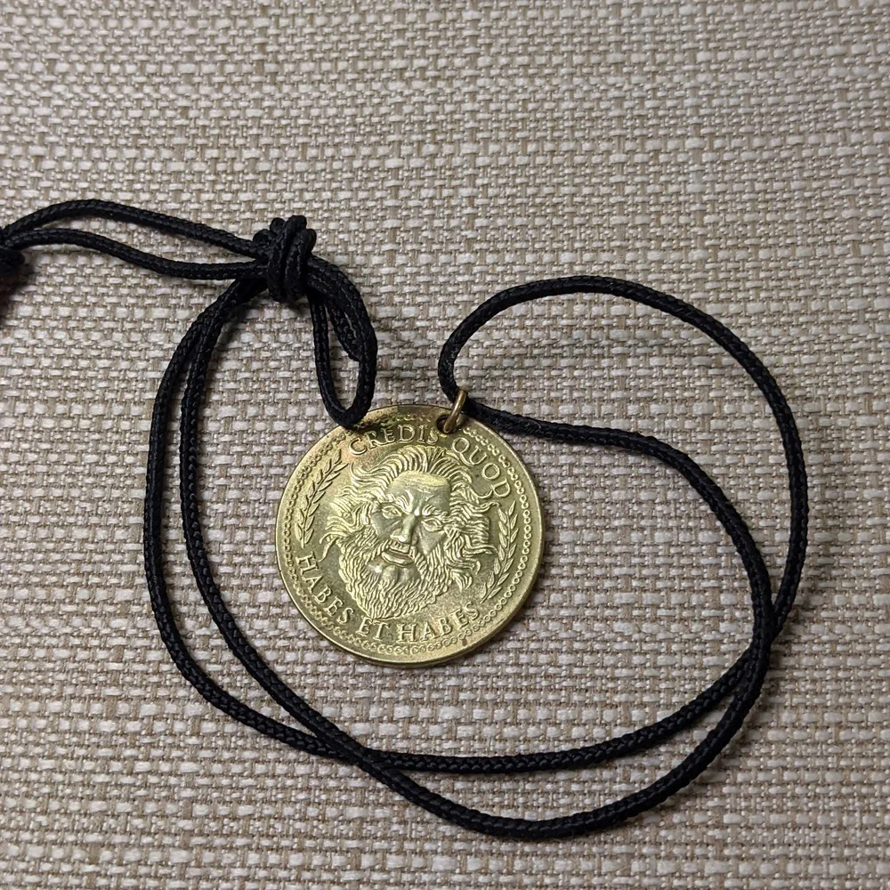 Caesars Palace Vintage Souvenir Medallion On Black Nylon Cord, 1996-2002